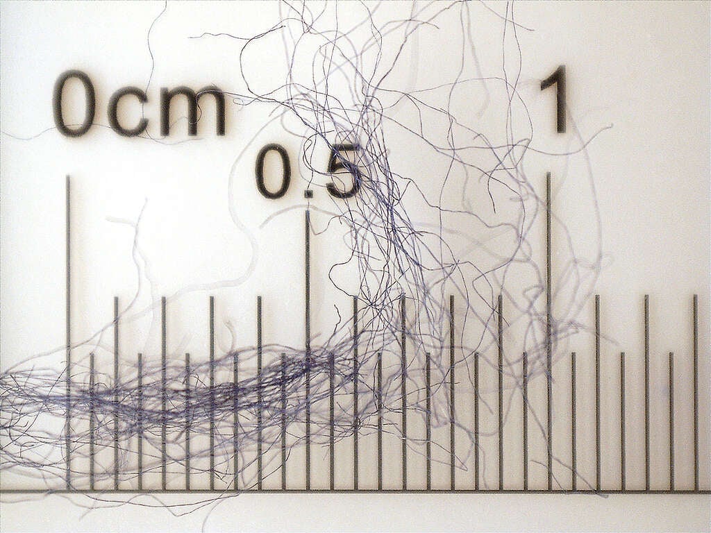 Microfibre under Microscope. Microfibre under Microscope. © Greenpeace