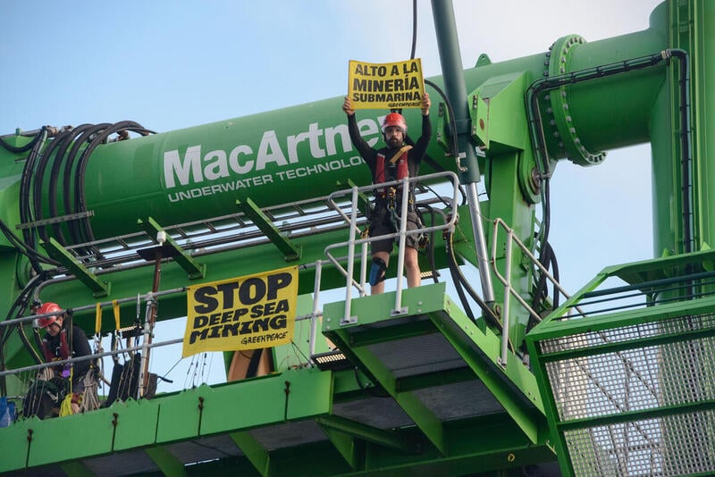 Greenpeace climbers on deep-sea mining ship in the at-risk Pacific region
