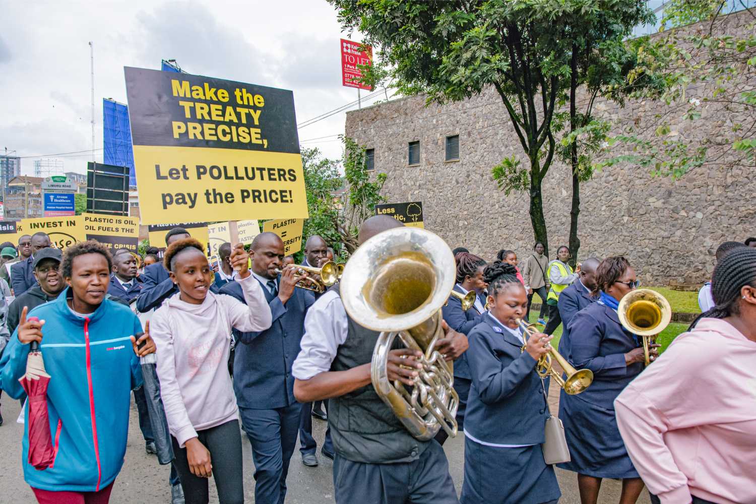 Activists fill the streets of Nairobi to demand world leaders deliver a strong treaty for people, community and climate.