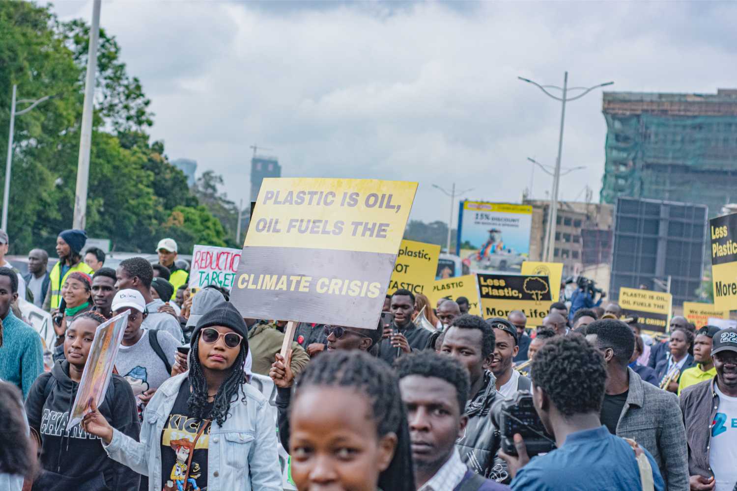 Activists fill the streets of Nairobi to demand world leaders deliver a strong treaty for people, community and climate.