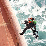 Two more Greenpeace climbers board the Shell oil platform that is being transported to an oilfield north of the Shetland Islands. 