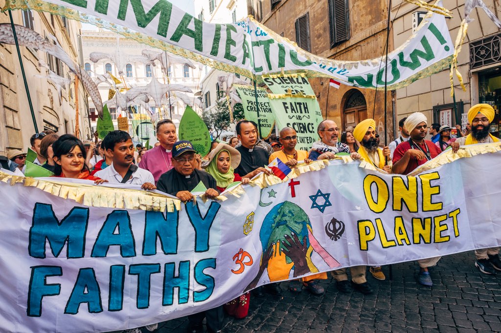 A climate change march with interfaith participants in Vatican City in 2015. Photo by: Mat McDermott / GreenFaith / CC BY-NC-ND