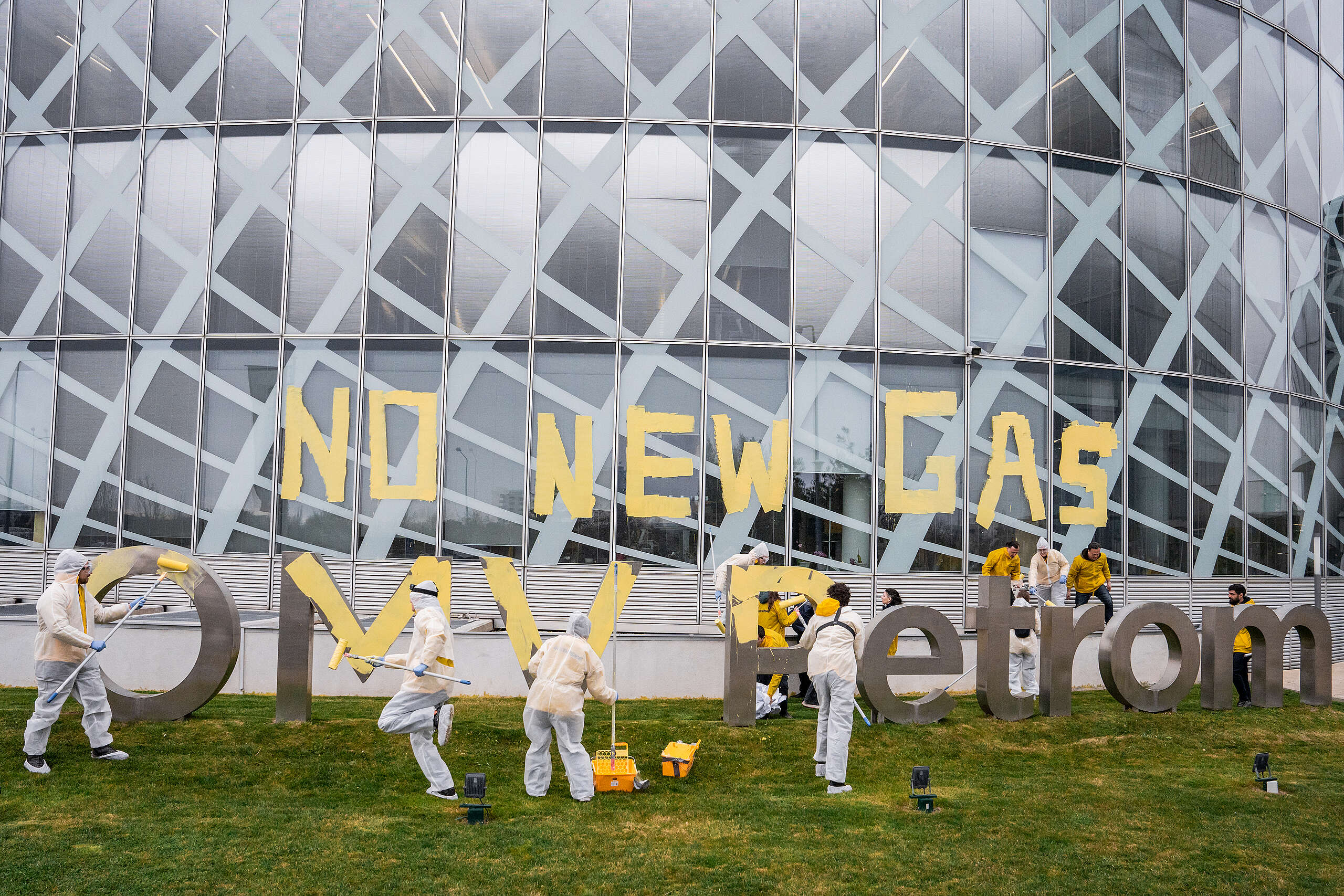 Activists paint 'No new gas' on OMV Petrom headquarters in Bucharest, Romania