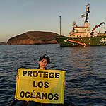 Spanish actor Alba Flores holds a banner reading 'Protege Los Océanos' (Protect The Oceans) from a RHIB close to Santiago Island, part of Galápagos Islands.

The Arctic Sunrise is on a six-week expedition around the Galápagos islands, with scientists from the Jocotoco Conservation Foundation, the Charles Darwin Foundation, the Galápagos Science Center, MigraMar and Galápagos park rangers. The expedition will showcase the power of marine protection by documenting the success of the Galápagos Marine Reserve through the incredible wildlife and habitats of the sea near the Galápagos. Data collected during the expedition will help to make the case for a new high seas protected area.