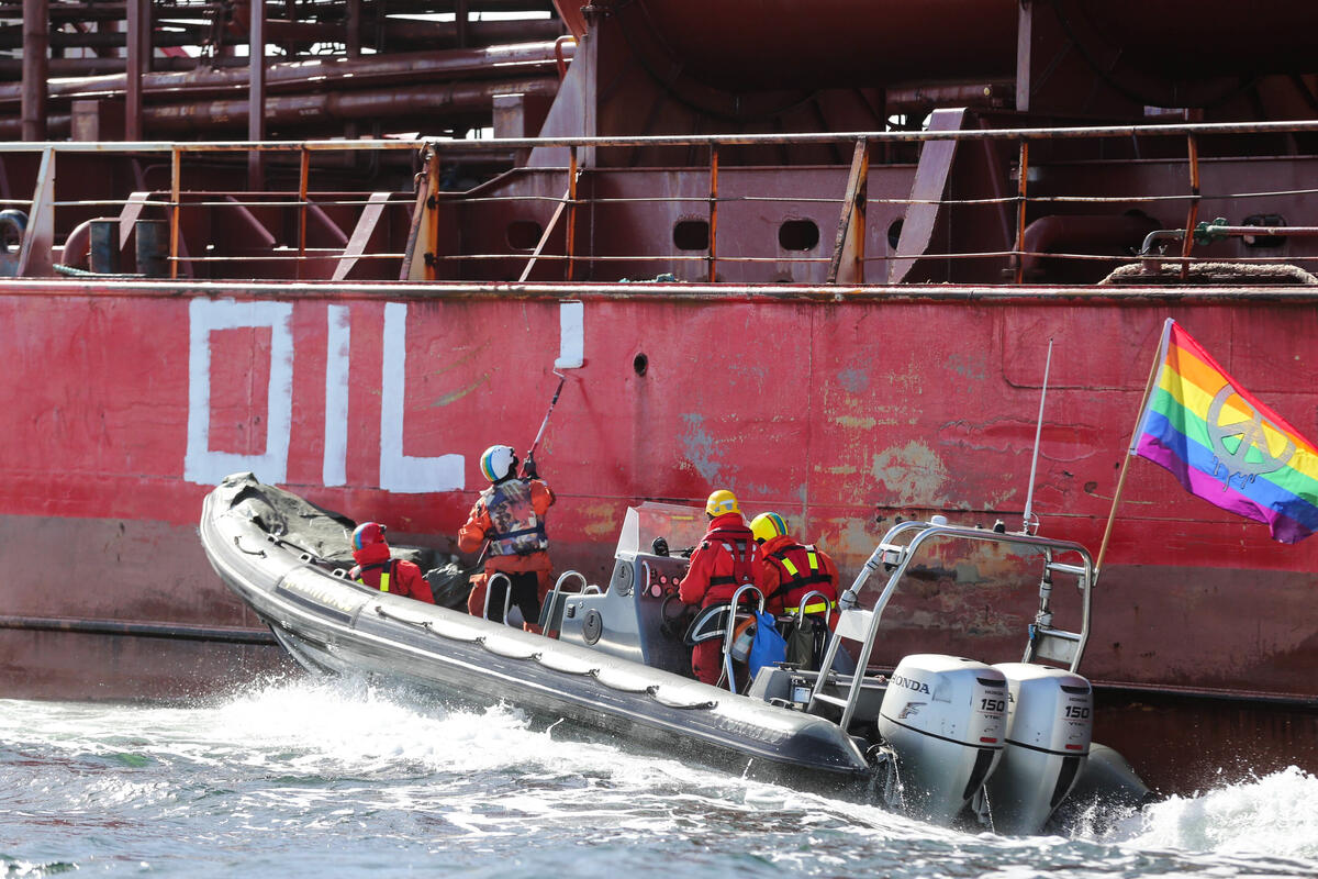 Protest against a Bunker Vessel Fueling the Russian 'Shadow' Fleet off the Swedish island Gotland. © Greenpeace / Will Rose