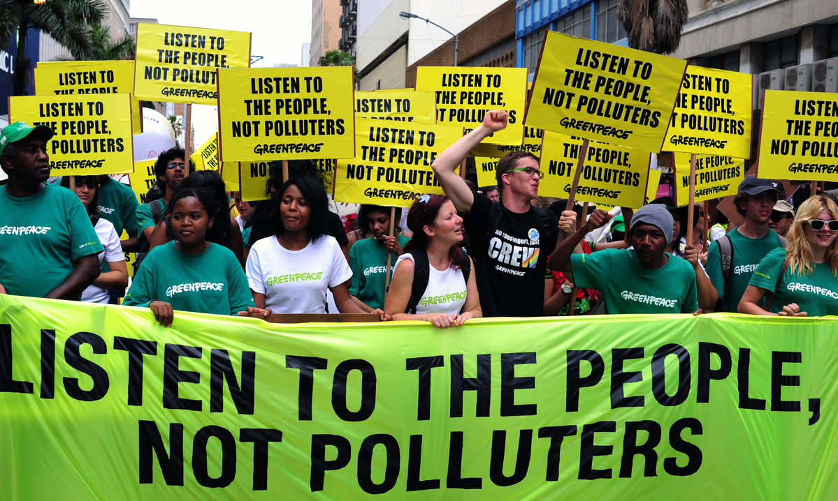 Climate Protest at COP 17. © Shayne Robinson / Greenpeace