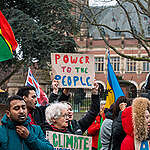 A powerful and diverse assembly of voices from around the globe gather in front of the Peace Palace in the Netherlands to demand climate justice. As the International Court of Justice prepares to begin its hearings on climate change and its impacts on human rights for current and future generations, this peaceful demonstration sets the stage for these historic discussions.