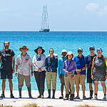 Team of scientists, RPA, with the Rainbow Warrior in the background.
40 years since Operation Exodus — when Greenpeace responded to the call of the Rongelap community to help relocate them from their ancestral lands as the impacts of decades of contamination from US nuclear weapons testing became clearer - the Rainbow Warrior returns.
In 1954, fallout from Castle Bravo nuclear weapons testing blanketed Rongelap atoll in radioactive ash—fine, white powder that children played in, thinking it was snow. The U.S. government waited three days to evacuate residents, despite knowing the risks. When they were allowed to return three years later, it was  a contaminated environment. The exposure caused severe health impacts: thyroid cancers, birth defects such as “jellyfish babies”, miscarriages, and more.
As part of the Marshall Islands ship tour, a group of Greenpeace scientists and independent radiation experts are in Rongelap to sample lagoon sediments and plants that could become food if people came back.