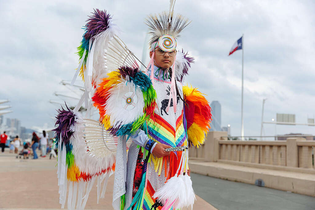 A portrait of Dallas Indigenous dancer Desi during a powerful sunset shoot on the Ronald Kirk Bridge, capturing movement, regalia, and song as symbols of resistance and cultural strength. Filmed for A portrait of Dallas Indigenous dancer Desi during a powerful sunset shoot on the Ronald Kirk Bridge, capturing movement, regalia, and song as symbols of resistance and cultural strength. Filmed for