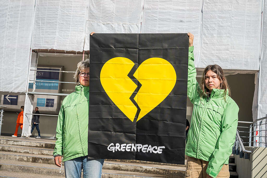 Greenpeace activists protest against animal suffering at an event held by the supermarket chain Edeka in Essen. The environmental activists show a banner and spray Symbols on the ground to draw attention to the contradiction between the suffering in the pig stables and Edeka's Greenpeace activists protest against animal suffering at an event held by the supermarket chain Edeka in Essen. The environmental activists show a banner and spray Symbols on the ground to draw attention to the contradiction between the suffering in the pig stables and Edeka's