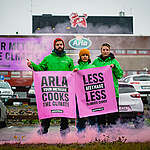 Banners read "Arla your methane cooks the climate" and "Less methane less climate chaos".
Greenpeace Nordic activists protest at Arla's dairy in Stockholm, the largest of its kind in Sweden. The protest is to bring attention to the Arla’s methane emissions and responsibility in contributing to the climate crisis. 

The protest is part of a global pressure with similar actions against a number of the 29 big, global meat and dairy corporations being critisised in a new Greenpeace Nordic report, for putting the climate at risk.