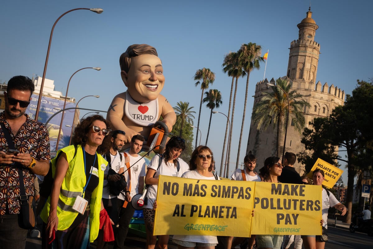 Giant baby Musk float in march for tax justice at UN summit in Sevilla: ‘Make rich polluters pay’