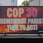 Greenpeace sends message to country delegates on the first day of SB62 Climate Conference in Bonn.