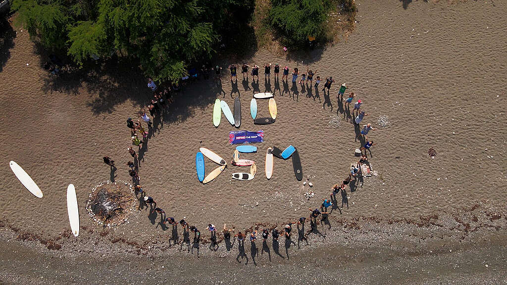 The Deep Sea Conservation Coalition, Greenpeace International plus other organisations and allies join a 'paddle out' at Jamnesia Surf School near Kingston, Jamaica. To call for the protection of the deep sea and to stop deep sea mining before it starts. The participants form the words The Deep Sea Conservation Coalition, Greenpeace International plus other organisations and allies join a 'paddle out' at Jamnesia Surf School near Kingston, Jamaica. To call for the protection of the deep sea and to stop deep sea mining before it starts. The participants form the words