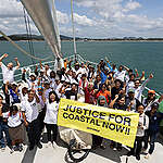 Greenpeace Thailand celebrate World Oceans Day with a photoshoot with local communities, Greenpeace activists, and partners, and followed by a panel discussion entitled “Local Community’s Participation in Policy Planning and Natural Resources Management”, 
in the coastal communities in Pathio District, Chumphon as part of the Rainbow Warrior Ship Tour 2024: Ocean Justice. 
The Greenpeace ship Rainbow Warrior is sailing around Thailand for the whole month of June to highlight the threats facing the Thai oceans and to demand for ocean justice and climate action.
In the afternoon, the ship was opened to the public for photo exhibitions featuring Thailand’s coastal communities and the Greenpeace Ocean Justice Campaign. The Rainbow Warrior crew also hosted a talk to discuss their campaigning experiences for the environment.