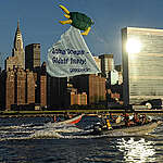 Greenpeace activists fly a giant turtle kite outside the United Nations headquarters in New York as countries gathered to begin negotiations, for the first time in history, towards a treaty covering all oceans outside of national borders.  The large and colorful kite, representing iconic marine life, was flown from boats on the East River.