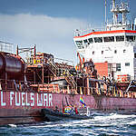 Protest against Russian 'shadow fleet' vessel off the Swedish island Gotland

April 12 2024 - This morning activists from Greenpeace Nordic launched a peaceful protest against a bunker vessel fuelling the Russian so-called shadow fleet in open sea off the Swedish island Gotland. The activists approached the vessel in two rhibs and painted OIL IS WAR - PEOPLE WANT PEACE on the side. The 125 metre long bunker vessel Zircone operates as a floating gas station, fuelling the shadow fleet. It’s a fleet of several hundred rusty tankers that are often worn out and old, missing inspections, have dubious insurance if any at all, obscure ownership and are registered in countries with lax regulations., Oil Fuels War - Protest at sea