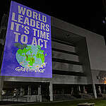 On the eve of COP30, Greenpeace projected a message to delegates at the UN Climate Summit in Belem