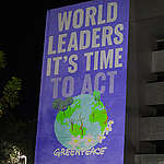 On the eve of COP30, Greenpeace projected a message to delegates at the UN Climate Summit in Belem