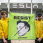 Greenpeace activists from Czechia, Slovenia, Slovakia, Austria and Poland climbed onto the roof of the Tesla showroom building near Prague and unfurled a banner reading “Our world is not your toy #TimeToResist.“ Other protesters placed a three-meter-tall caricature of billionaire Elon Musk and U.S. President Donald Trump in front of the building, depicting them together setting the world on fire. At the same time, activists replaced the company’s flags with ones featuring images of Trump and Musk with the slogan “Stop the billionaire takeover.” 
The event is part of global campaign called Time to Resist, carried out by different organisations from Greenpeace network across various countries. The campaign is a response to the way billionaires and fossil fuel corporations are openly attacking not only the environment but also civil society. Specifically, U.S. President Donald Trump and his billionaire allies present threat to NGOs, the media, scientists, and environmental defenders, as they deny or downplay the current climate crisis in public discourse and on social media.