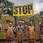 Greenpeace Indonesia holds a theatrical action to protest the National Strategic Project (PSN) of Sugarcane Merauke in front of the Coordinating Ministry for Economic Affairs office in Jakarta. Greenpeace condemns the massive deforestation that has occurred in Merauke, caused by this sugarcane project; at least 560,000 hectares of forest have been destroyed in Merauke, South Papua.