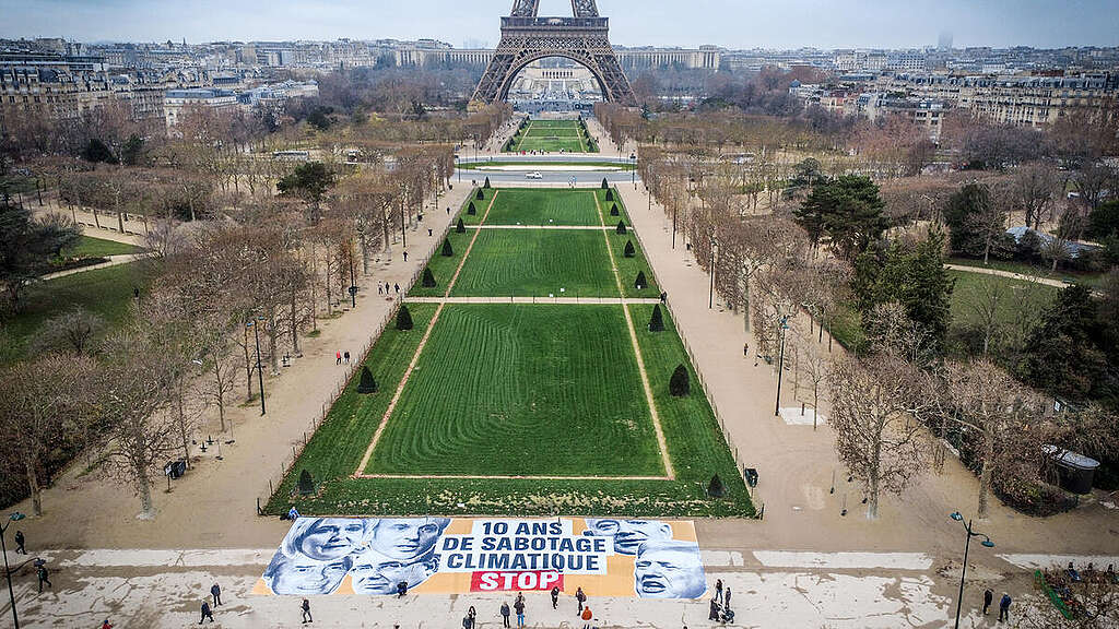 Action: A giant banner unfurled to denounce those responsible for sabotaging the Paris climate agreement. © Greenpeace Action: A giant banner unfurled to denounce those responsible for sabotaging the Paris climate agreement. © Greenpeace