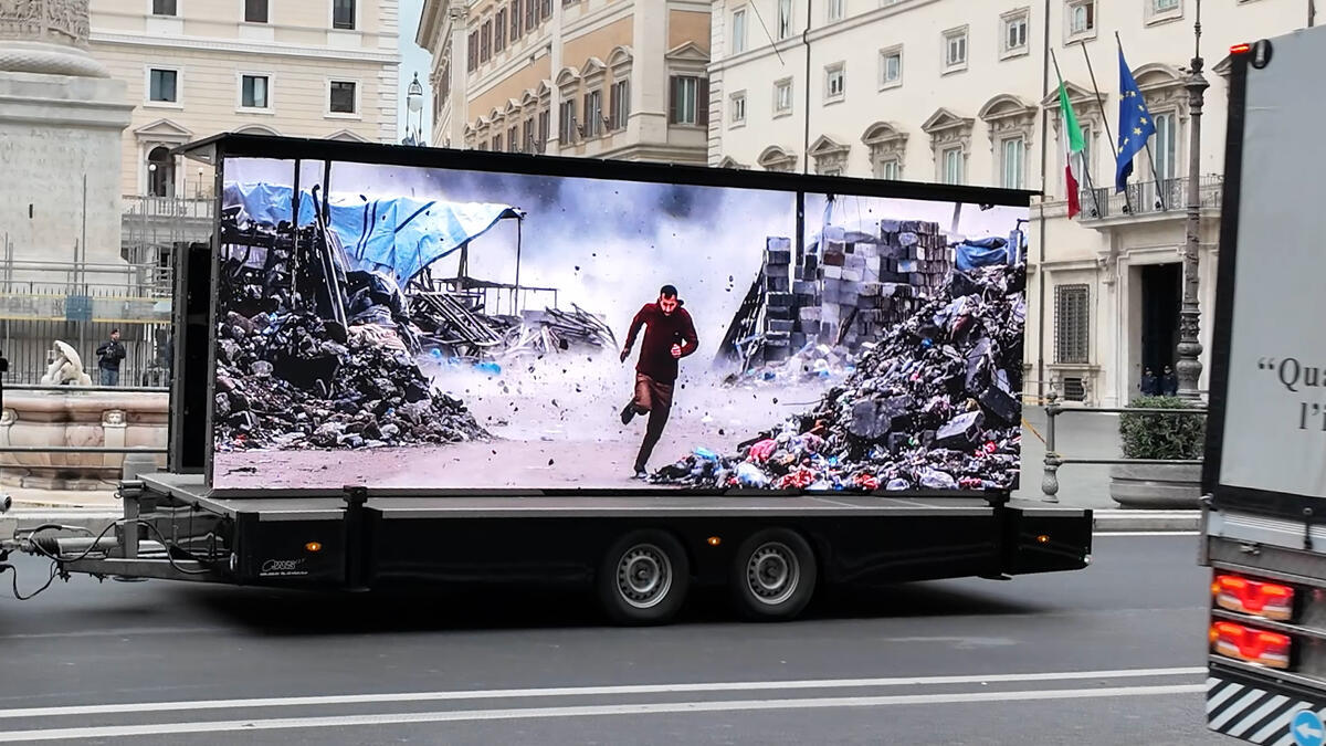 Mobile Projection Action in Rome 'Stop the Genocide'. &copy; Francesco Alesi / Greenpeace