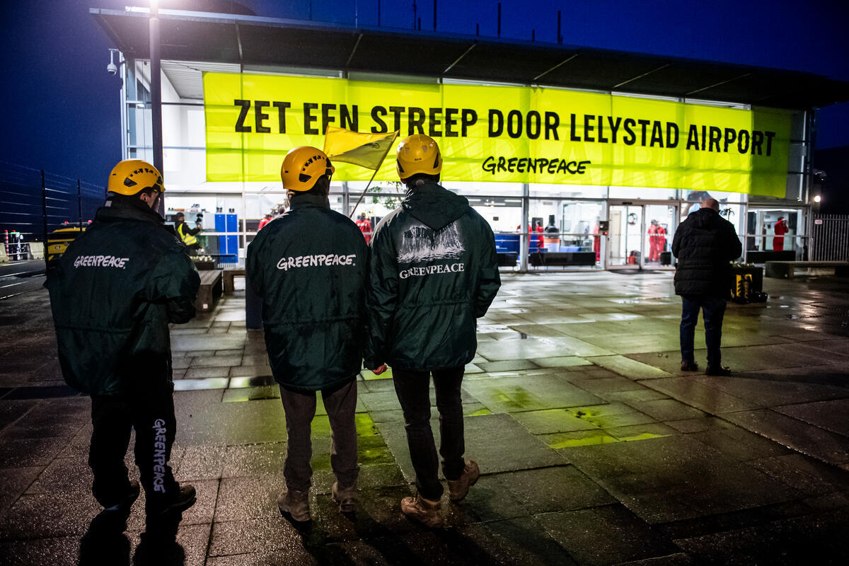 Greenpeace Activists Occupy Lelystad Airport in the Netherlands. &copy; Marten  van Dijl / Greenpeace