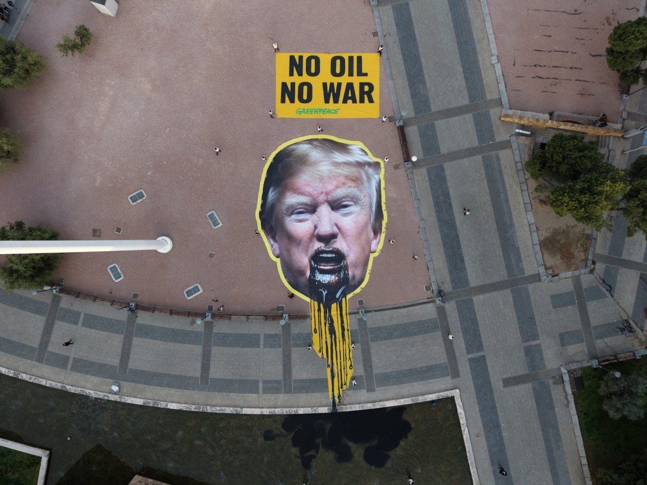Activists show Trump figure vomiting oil, call for ‘No oil, No war’ ahead of Santa Marta fossil fuel phase out meeting