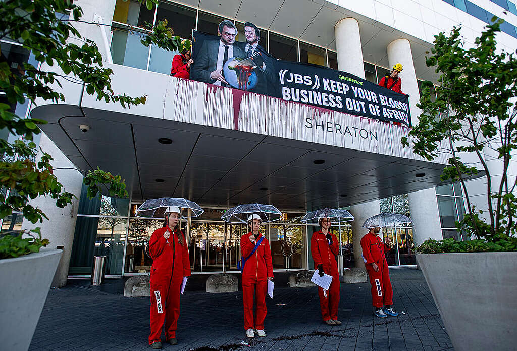 Greenpeace Netherlands Activists Disrupt JBS Shareholders’ Meeting in Amsterdam. © Marten van Dijl / Greenpeace Greenpeace Netherlands Activists Disrupt JBS Shareholders’ Meeting in Amsterdam. © Marten van Dijl / Greenpeace
