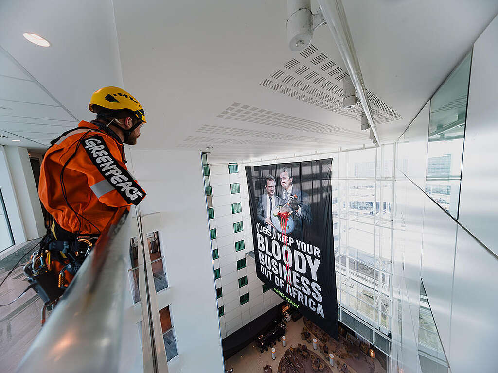 Greenpeace Netherlands Activists Disrupt JBS Shareholders’ Meeting in Amsterdam. © Tengbeh Kamara / Greenpeace