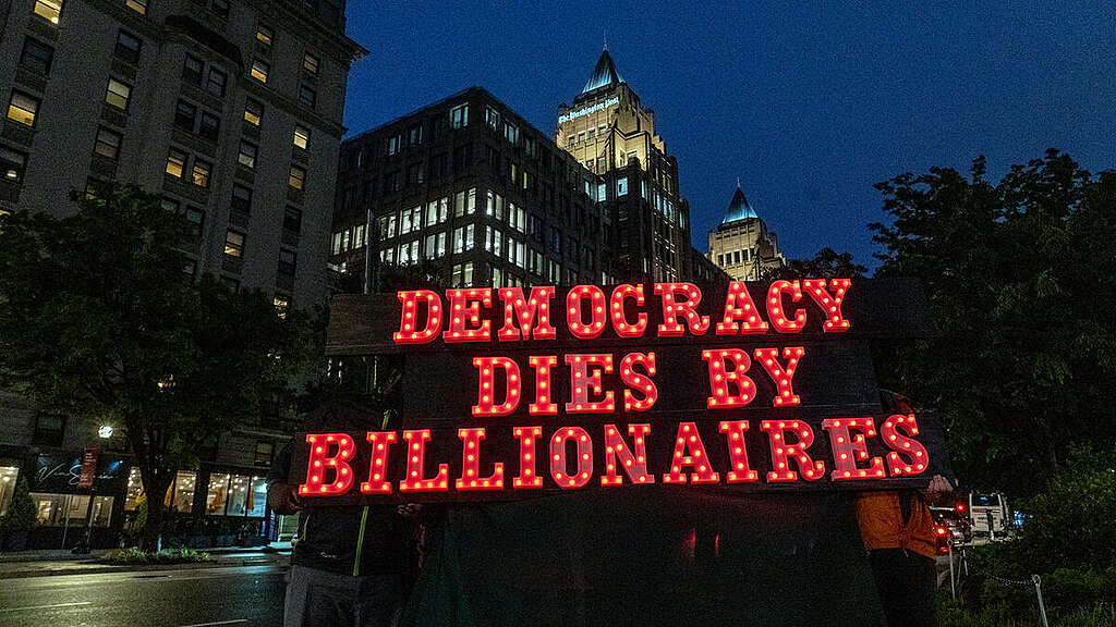 Democracy Dies By Billionaire. © Tim Aubry / Greenpeace
