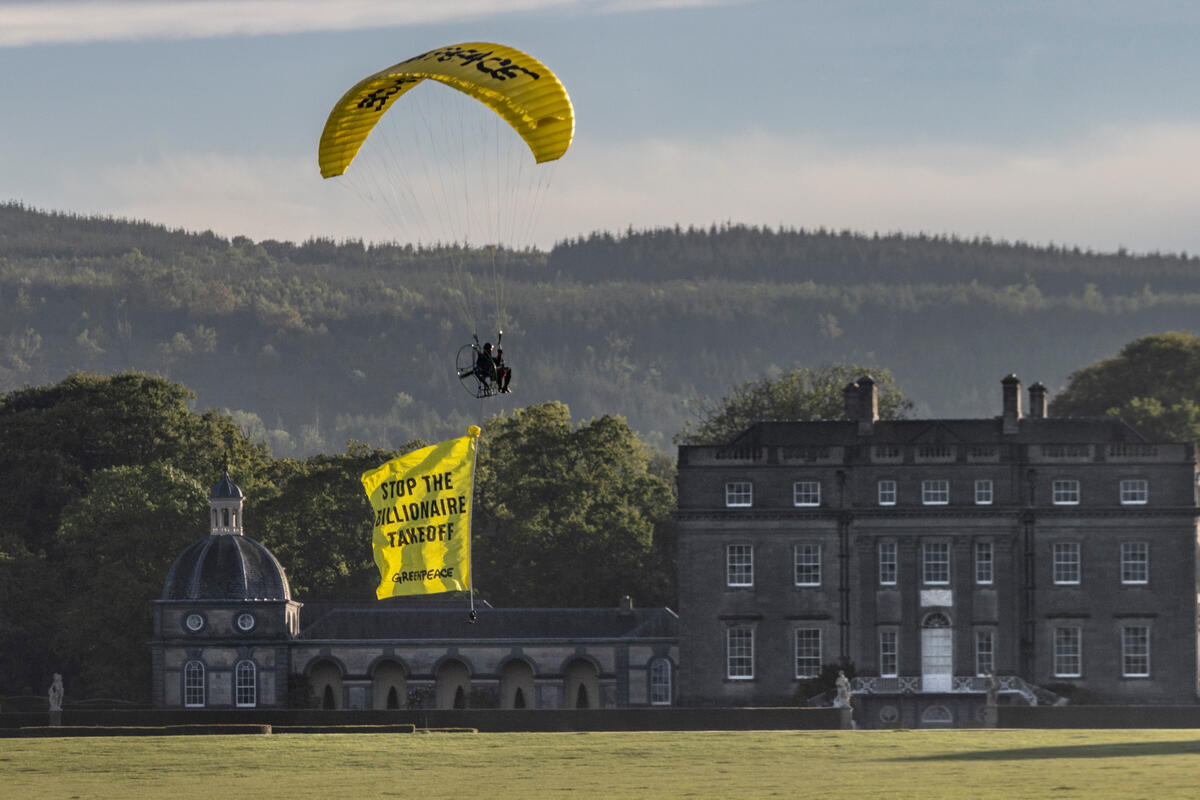 Greenpeace activists fly ‘Stop the Billionaire Takeoff’ message ahead of Kelcy Warren’s Waterford airport takeover ceremony