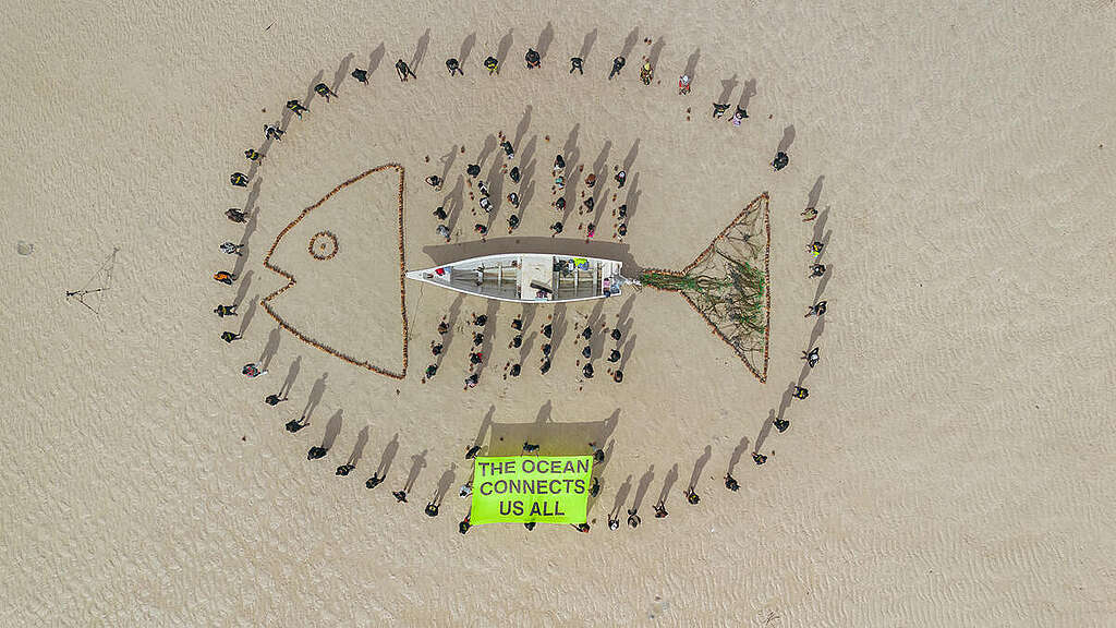 Our Oceans Conference - Sand Art installation in Kenya Volunteers and community members gathered at Pirates Beach/ Jomo Kenyatta Beach in Mombasa, Kenya around a sand installation carrying the message