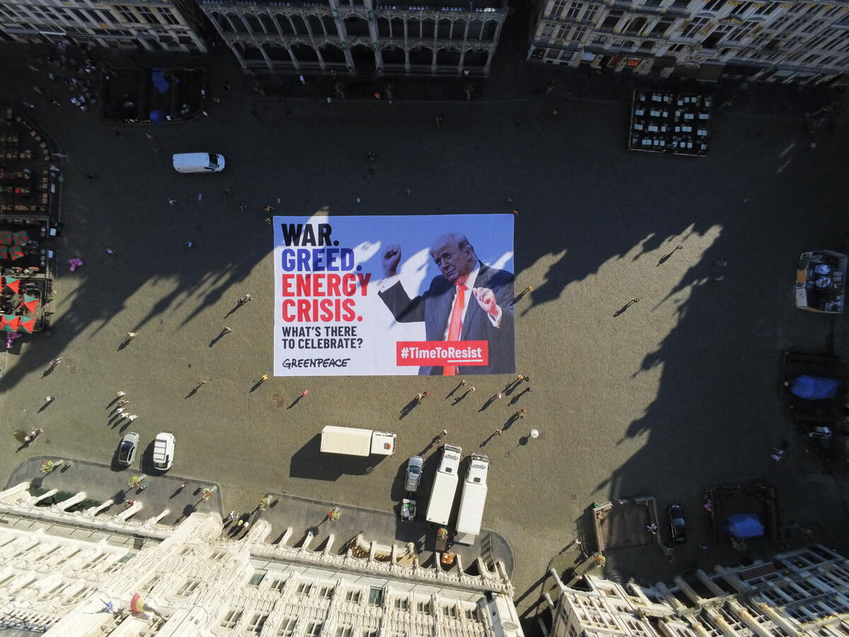 Greenpeace unfolds massive anti-Trump banner ahead of US 250th celebration in Brussels