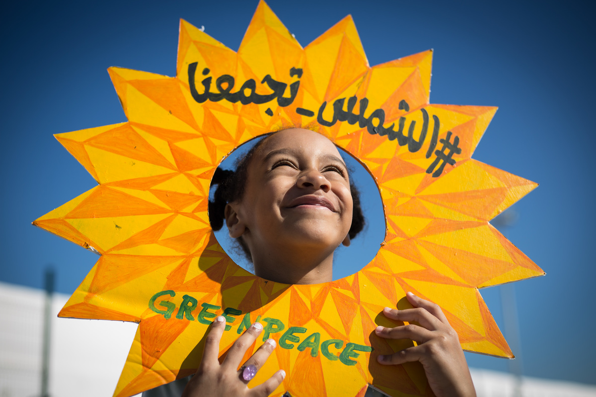 Rainbow Warrior Open Boat in Tangiers A girl poses with a sign representing the sun.Greenpeace's ship the Rainbow Warrior holds an open boat day for the public in Tangiers, Morocco, as part of The Sun Unites Us tour promoting solar power in the Arab world in the run up to the COP22 United Nations Climate Change conference.