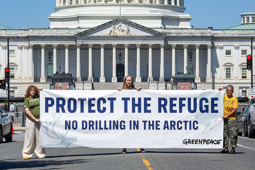 Activists hold a banner near the US. Capitol Building in Washington DC demanding protection of the Arctic National Wildlife Refuge. The federal government plans to open the Coastal Plain of the refuge for oil & gas drilling in a lease sale June 5, 2026.