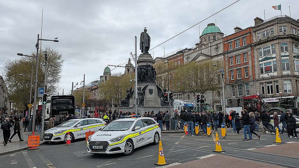 1280px-Irish_fuel_protests_in_Dublin_-_10_April_2026_-_5 April 2026: Northeast corner of R105 and O'Connell Street Lower in Dublin City Centre, blockaded during the 2026 Irish fuel protests, with law enforcement present.
