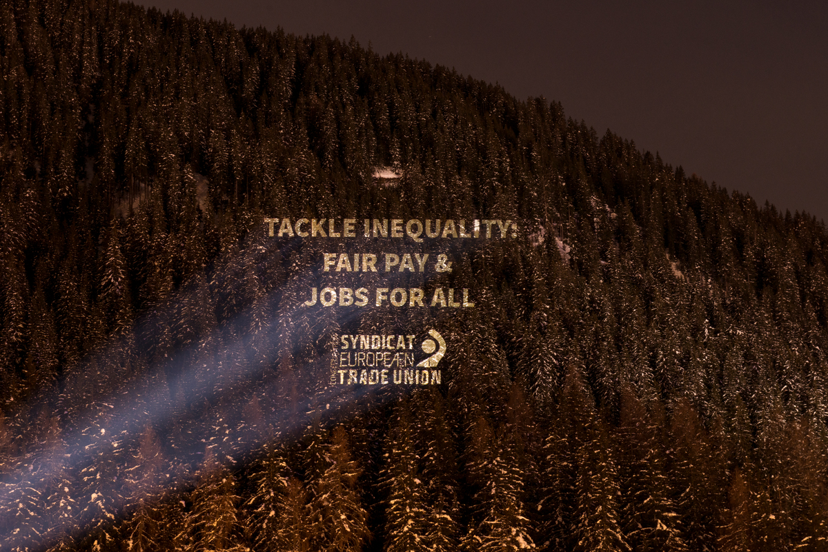 Greenpeace Justice Activity at the World Economic Forum in Davos Civil society comes together to demand change from leaders at the World Economic Forum: Greenpeace Switzerland activists project messages from Amnesty International, European Trade Union Confederation, Fight Inequality Alliance, Greenpeace, International Trade Union Confederation, Public Eye, Attac Switzerland and the Swiss Coalition for Corporate Justice onto the hillsides facing the World Economic Forum. The messages are united in their demands to leaders for urgent changes to an unjust system that exacerbates inequality, damages the environment, threatens human rights and creates injustice.