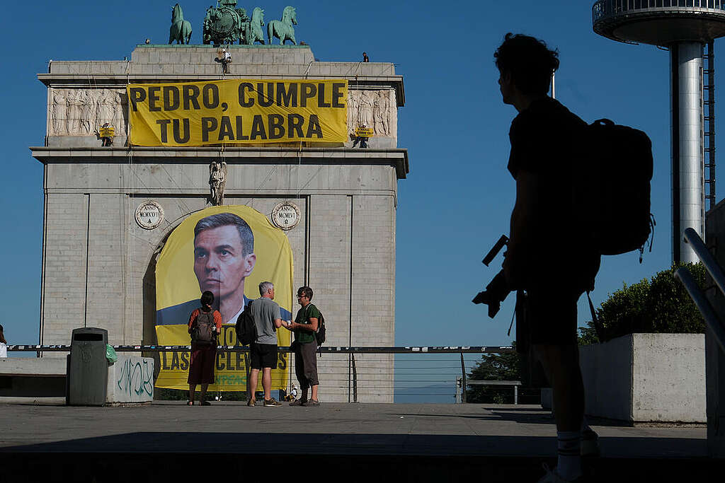 Greenpeace Spain activists displayed a banner in Madrid on the Moncloa Arch with the message: 