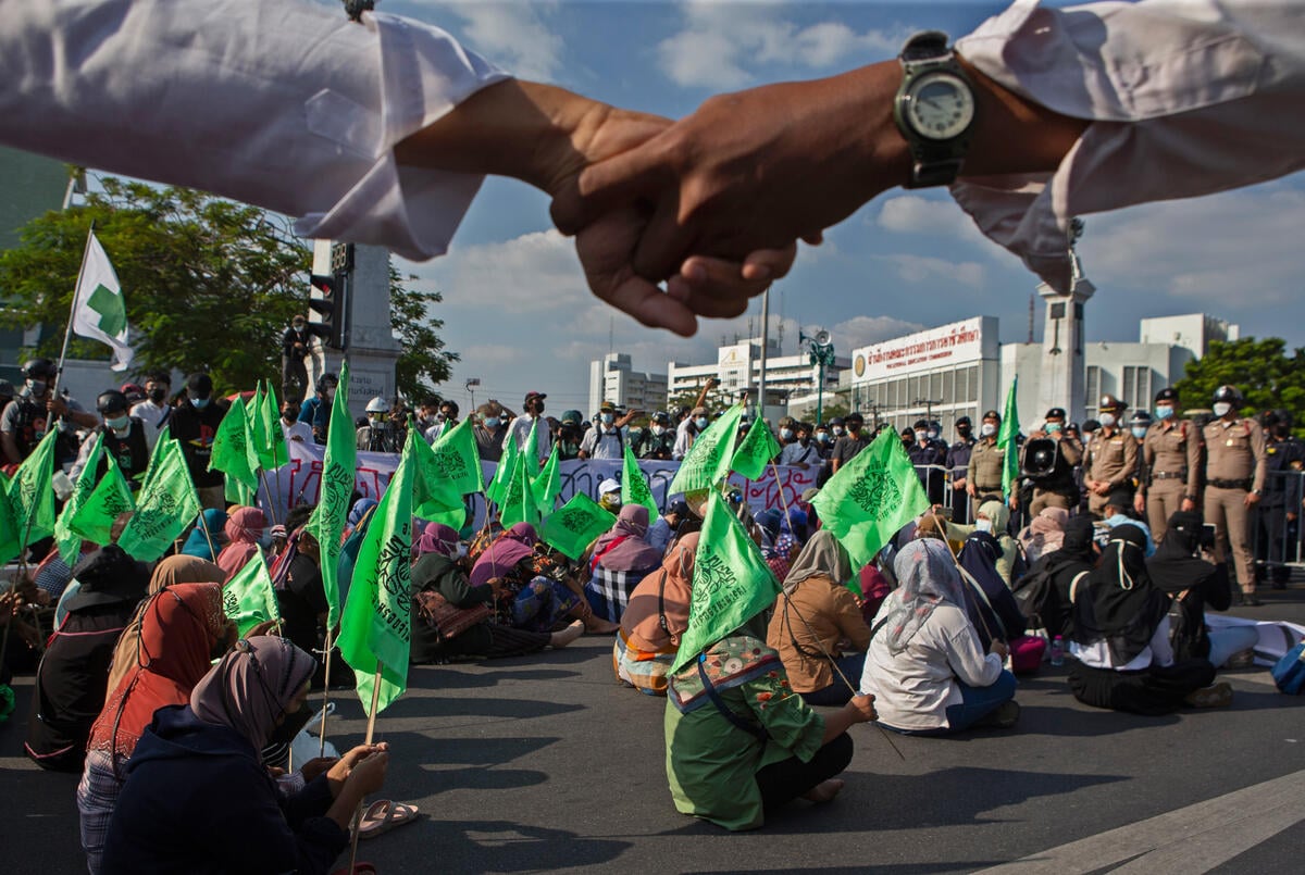 The local people of Chana (Chana Rak Thin movement) walked to the Government House in Bangkok to ask the government to uphold their promise to pause the industrial project until environmental impact assessment is completed
