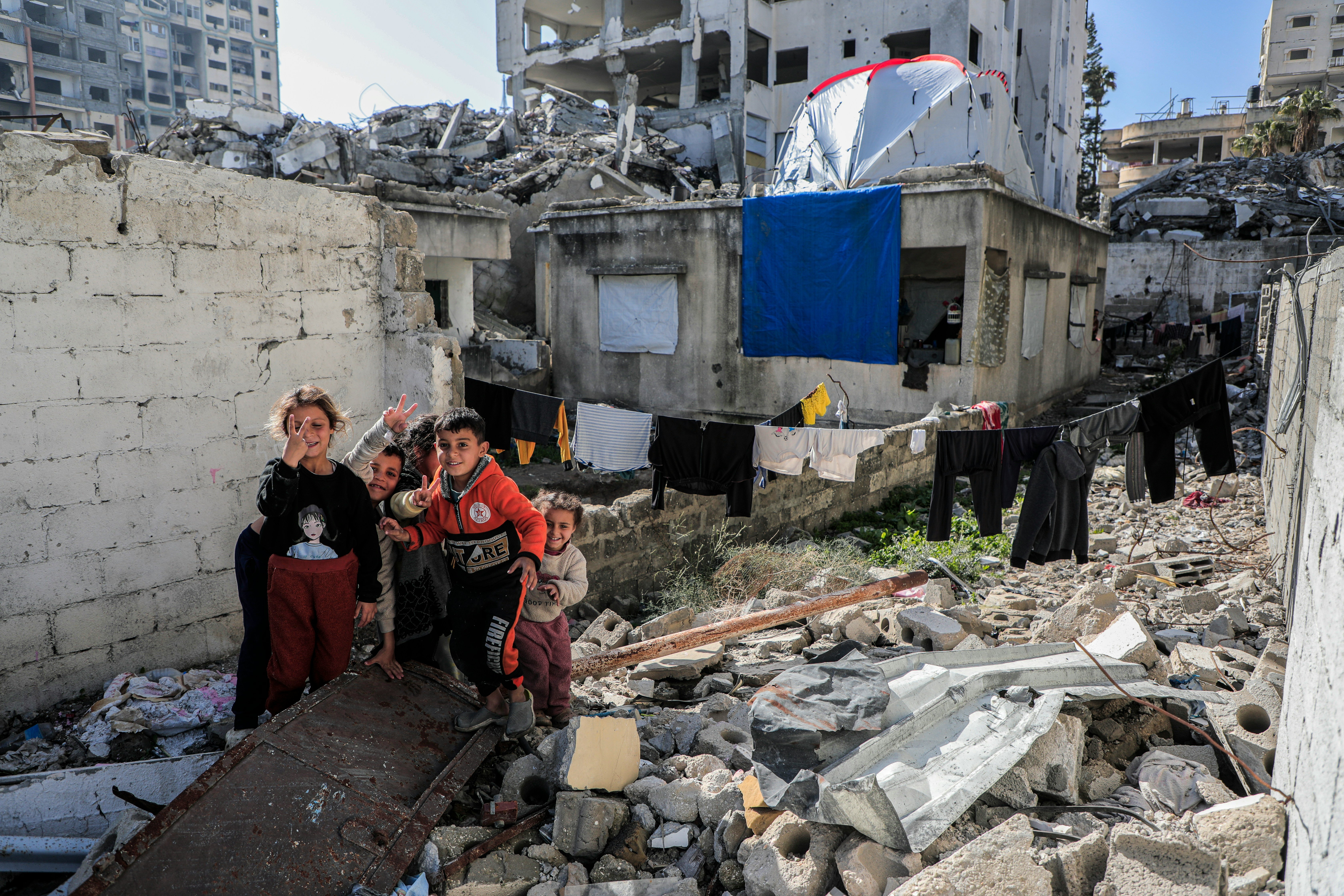children in gaza feb 2025 - mohammed-ibrahim-unsplash February 2025: Children amid damaged homes and rubble in Gaza. Photo: Mohammed Ibrahim / Unsplash.