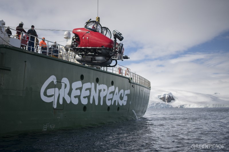 Dr. Susanne Lockhart and submarine pilot Kenneth Lowyck in the cockpit of a submarine that is being launched from Greenpeace vessel the Arctic Sunrise, outside Joinville Island in the Antarctic Sound at the opening of the Weddell Sea. Greenpeace is conducting submarine-based scientific research to strengthen the proposal to create the largest protected area on the planet, an Antarctic Ocean Sanctuary.