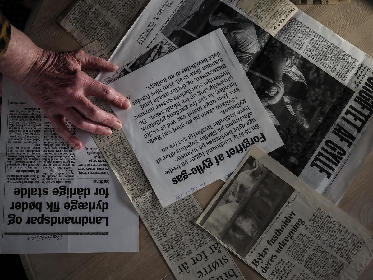 Woman Living in Tingerup Collects Articles about Factory Farming, Denmark. © Greenpeace / Wildlight / Selene Magnolia