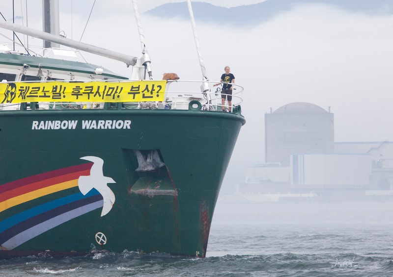 20130715 SOUTH KOREA KORI : The Greenpeace flagship Rainbow Warrior is seen in front of the Kori 1 nuclear reactor as the group calls for nuclear energy phase out starting with the Kori 1 reactor, the oldest nuclear facility in the country. The Rainbow Warrior is on its ‘Nuclear Emergency Tour’ of Korea with the aim of demanding for proper nuclear emergency plans. Before the protest, the Rainbow Warrior blew its siren towards the power plant to alert the public of the danger it poses. Every 15th of the month, Korea holds an emergency drill in preparation for a military attack. There is however no proper drill in case a nuclear meltdown occurs. ALEX HOFFORD / GREENPEACE