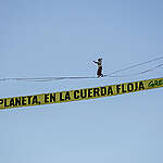 COP30 Action “The Planet on a Tightrope” in Madrid. © Pablo Blazquez / Greenpeace