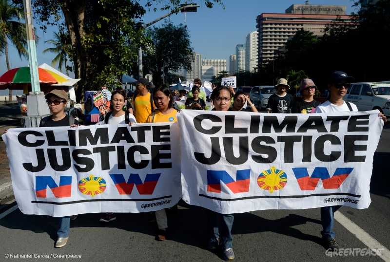 Participants of the "Climate Walk: A People's Walk for Climate Justice"during it's kick off at the historic kiilometer Zero in Luneta in Manila, organised by the climate advocates from Philippine Climate Change Commission, Greenpeace, National Youth Commission, Philippine Rural and Reconstruction Movement, Philippine Movement for Climate Justice, Aksyon Klima, Sanlakas, Dakila and other civic groups.Climate Walk is a 40-day, 875 KM journey from Manila to the ground zero in Tacloban City by the 8th of November, to commemorate the first anniversary of super typhoon Yolanda (Haiyan), a historic landfall in the Philippines. The organisers hope to raise awareness on climate change and mobilise people in demanding world leaders to take climate action and hold industry polluters  and their respective governments accountable for their contribution to the climate crisis.
