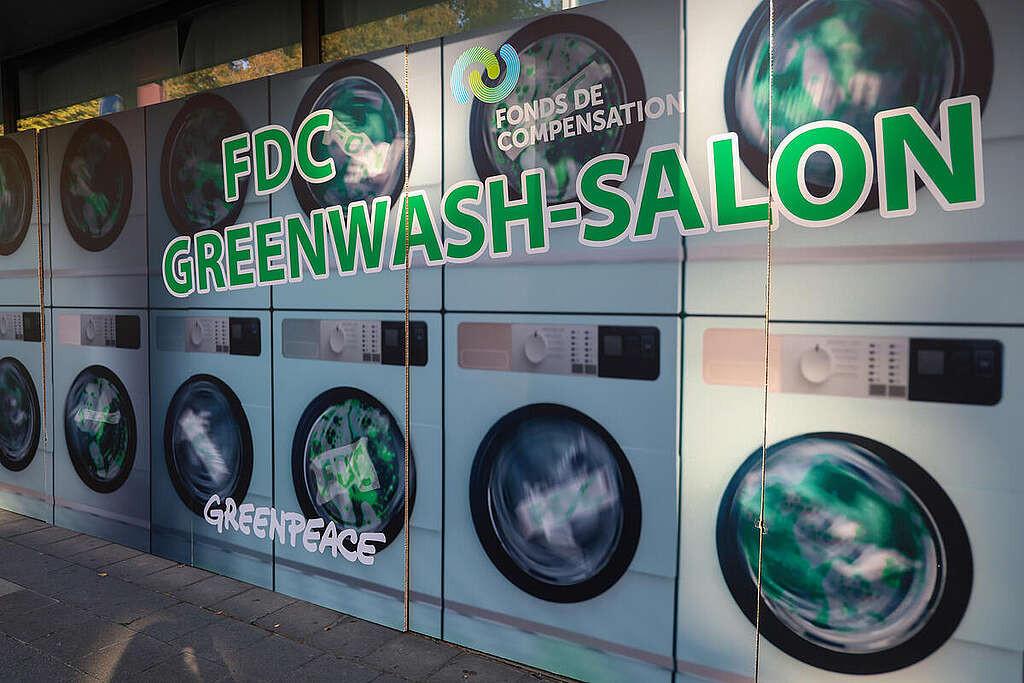 Protest at National Pension Fund Headquarters in Luxembourg. © Anais Hector / Greenpeace