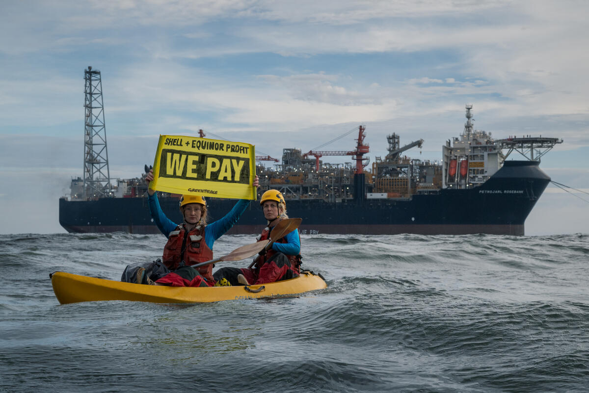 Rosebank Production Ship Pursued and Painted by Rainbow Warrior in Namibia Six activists in kayaks and RHIBs surround the Rosebank with banners protesting their plans, reading ‘OIL WAR PROFITEERS’, ‘STOP ROSEBANK’ and ‘SHELL + EQUINOR PROFIT, WE PAY‘