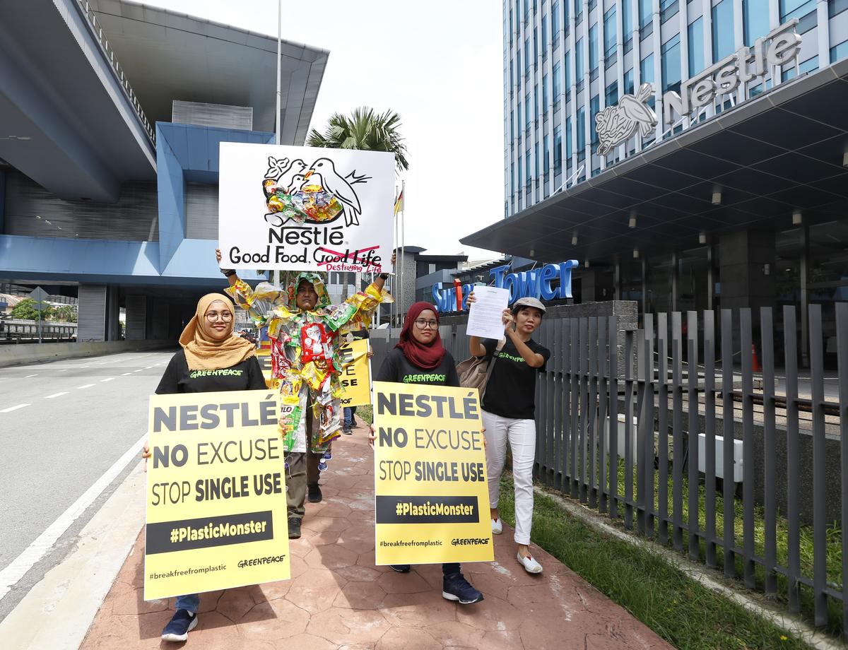 Plastic Monster Action at Nestle Headquarter in Malaysia. © Nandakumar S. Haridas / Greenpeace